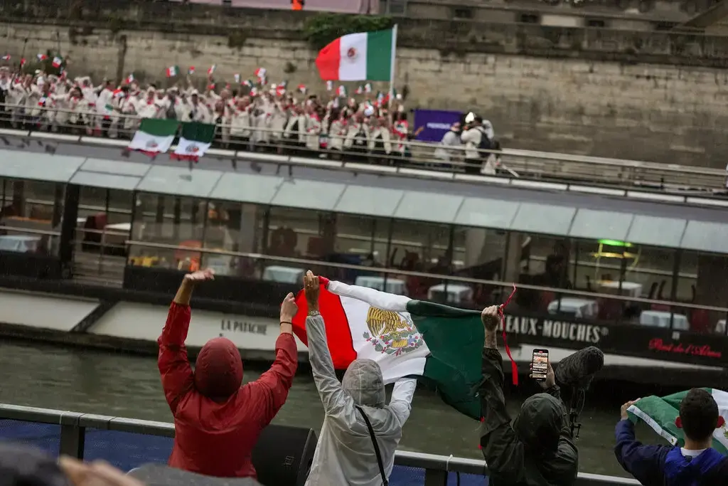 Fans cheering on Team Mexico