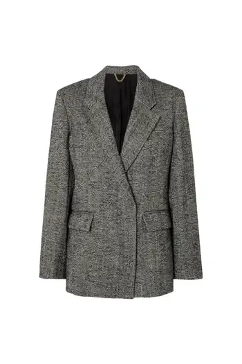 Five things every woman should know before buying a tweed blazer
