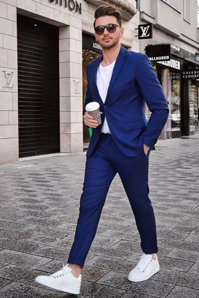 A man looking sharp in a blue suit