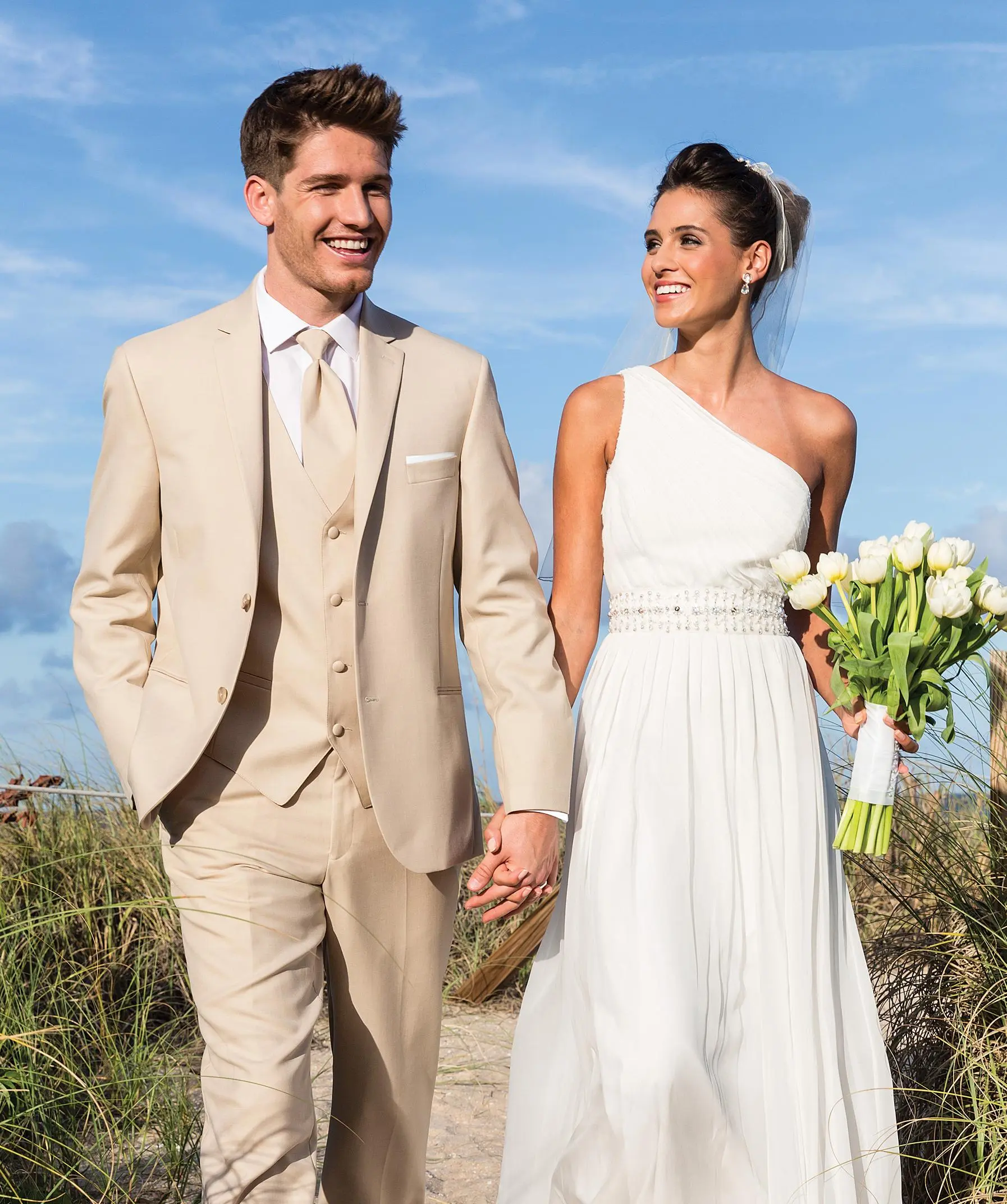 groom in a tan suit