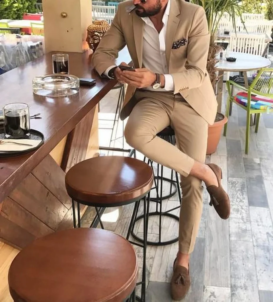 Every man should have a tan suit; it is timeless and effortlessly cool